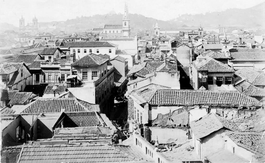 A black and white photo of a city

Description automatically generated